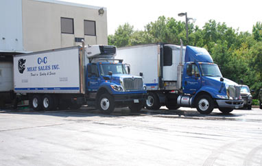 Two of our trucks posing for a photo